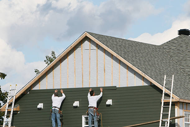 Professional Siding Replacement technician working in Leetonia, OH
